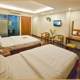 Phòng Deluxe Triple - Khách Sạn Nouveau Happy Inn